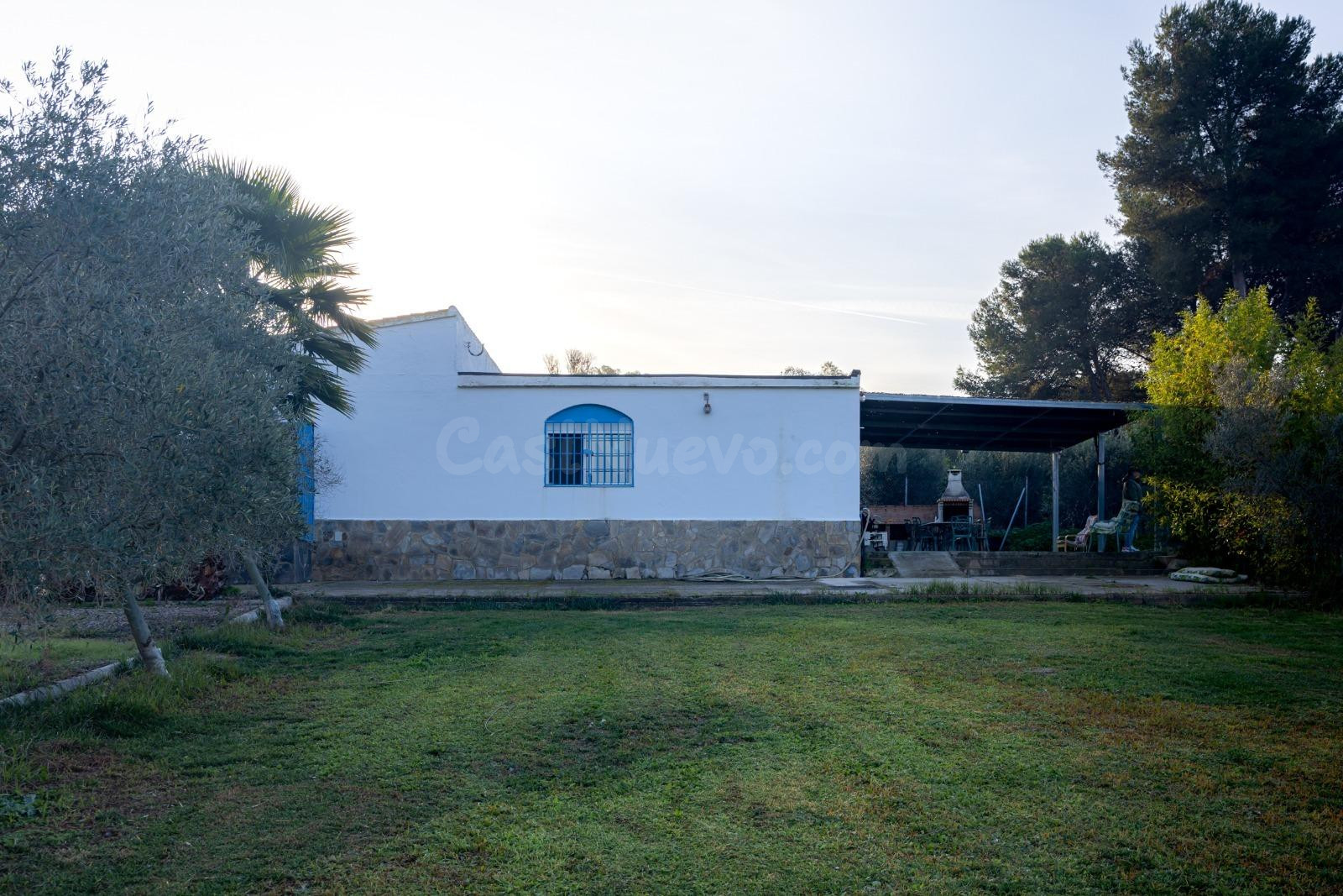 PARCELA CON CASA JUNTO A MONTECASTILLO