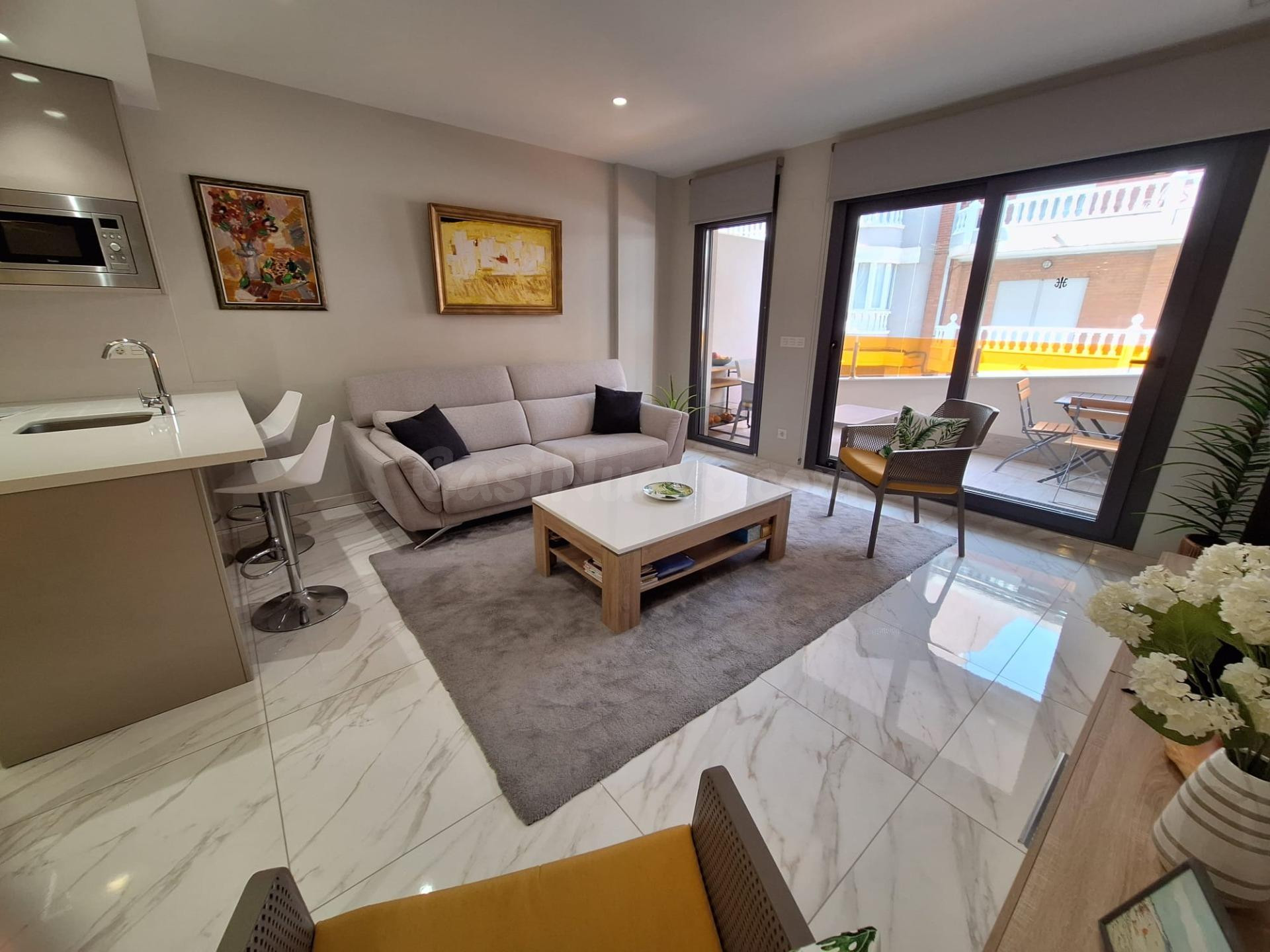 Apartamento semi-nuevo en el prestigioso edificio Alegría 11 con 2 dormitorios, sauna y garaje opcio