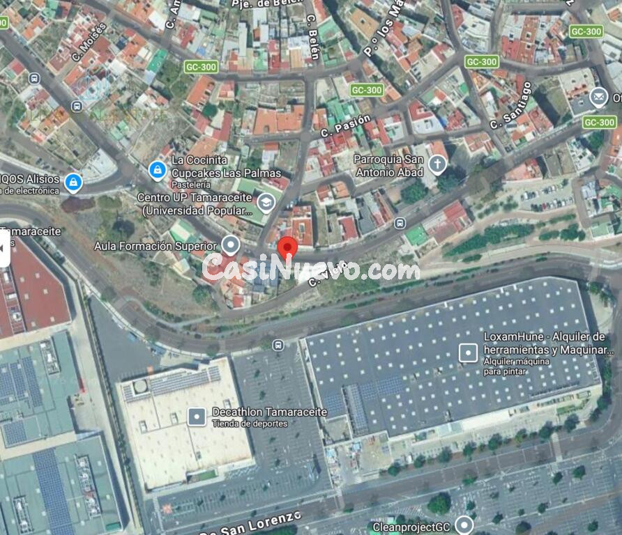 Solar con edificación cerca de Centro comercial