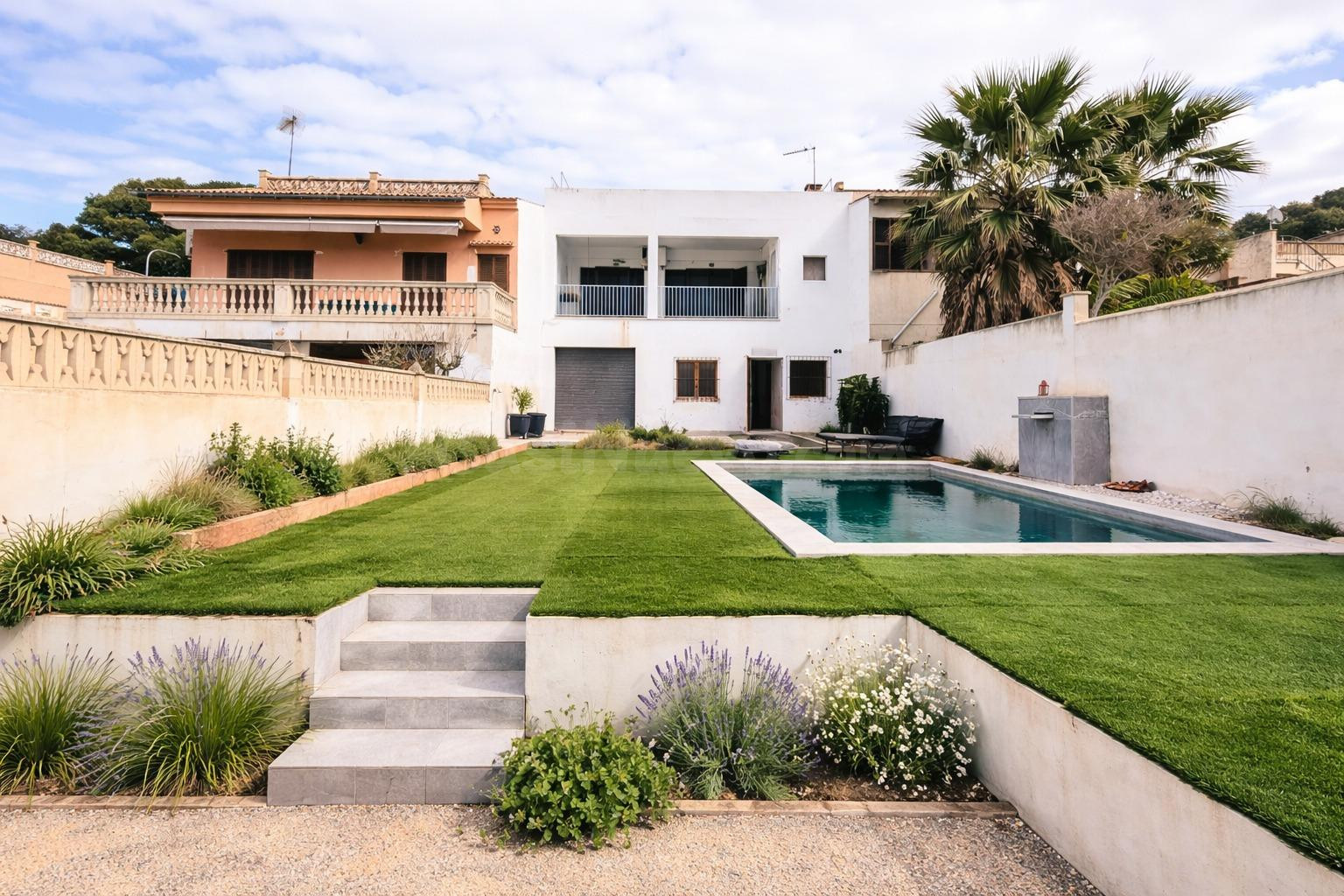 Casa adosada con jardín en Bellavista