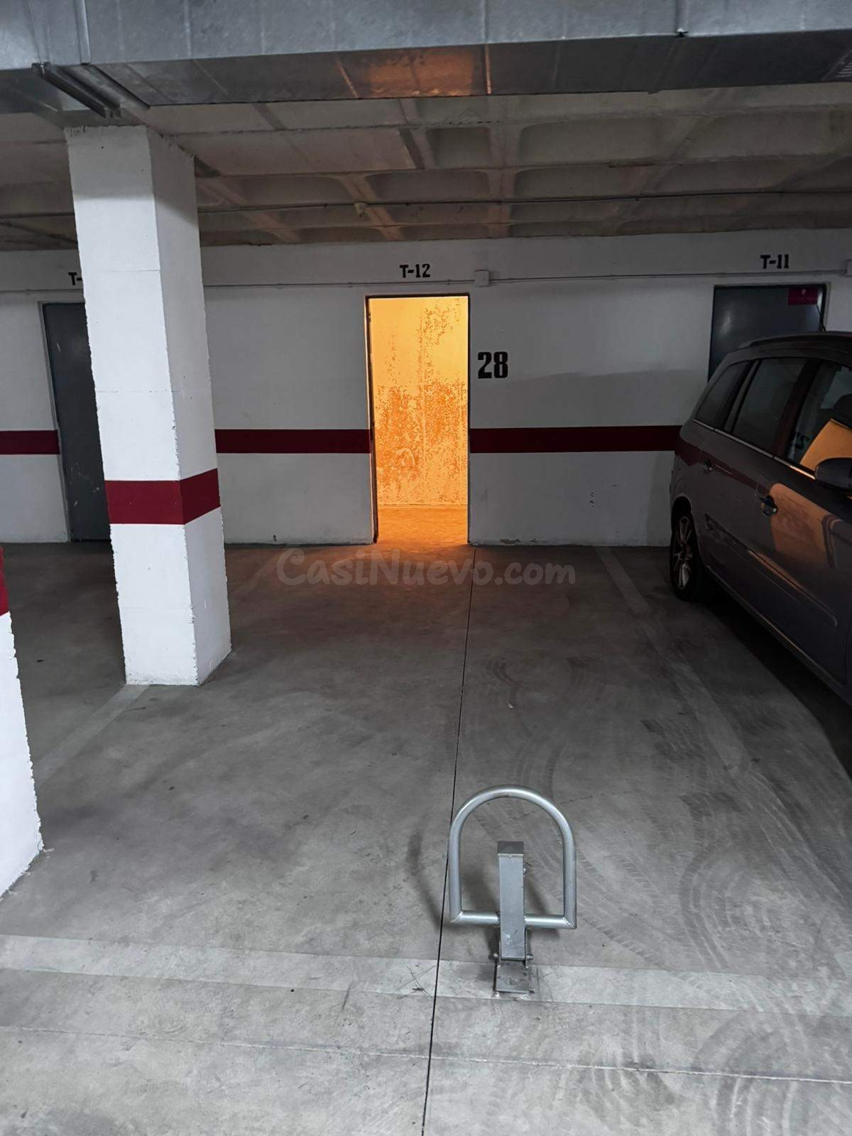 Plaza de garaje con trastero