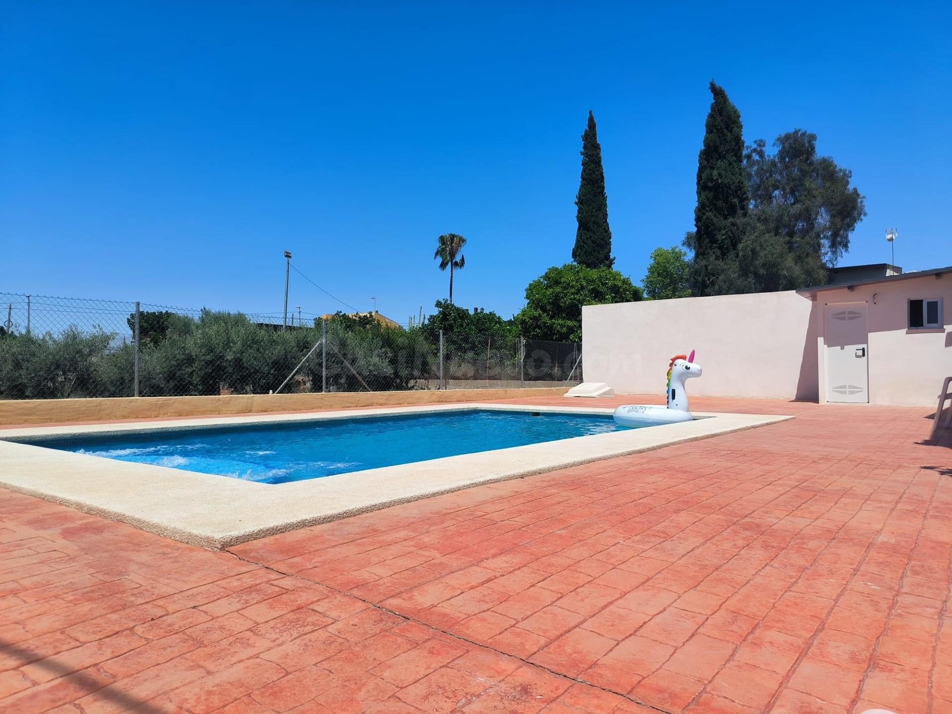 Casa en parcela con piscina