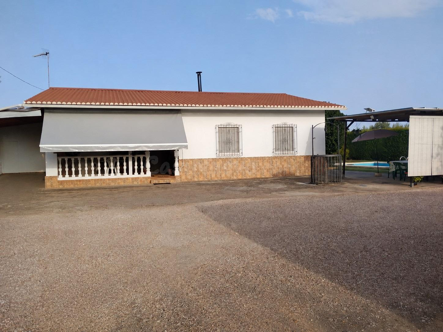 E. Casa Rústica con Olivar de Regadío, Piscina de 29 m2 y Huerto