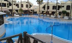 Exclusivo dúplex con jardín privado, vistas panorámicas al Teide y piscina en Costa del Silencio