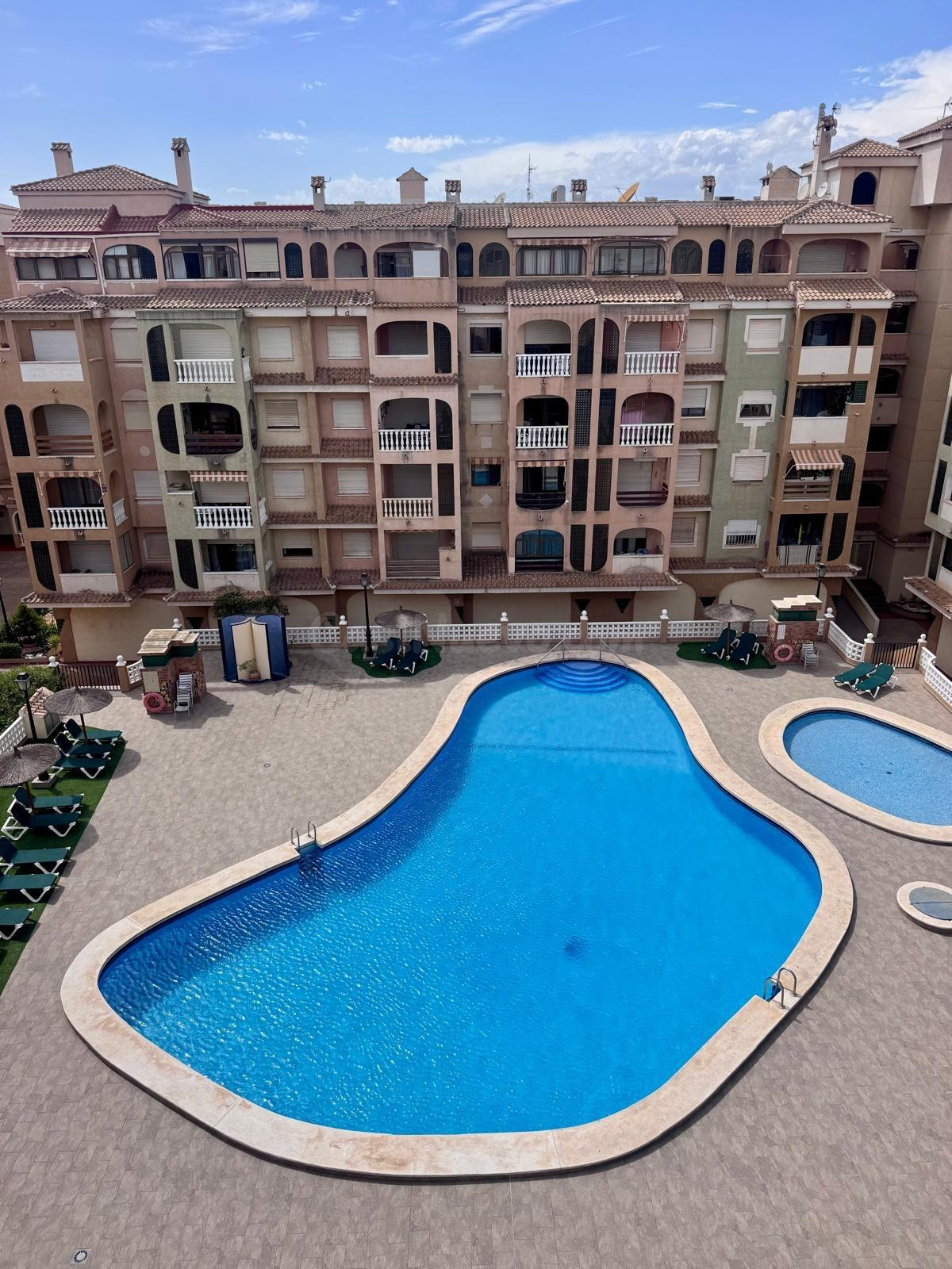 APARTAMENTO DE 2 DORMITORIOS CON PISCINA COMUNITARIA EN RESIDENCIAL JARDIN BOTANICO