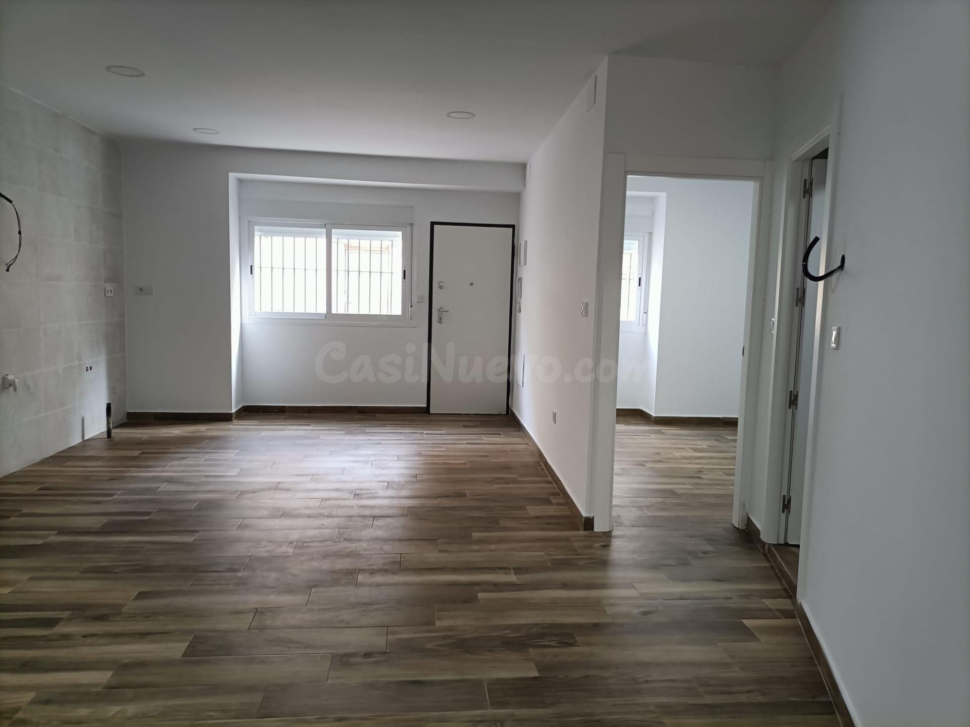 VIVIENDA CON PATIO Y COCHERA PRIVADA CERCA DEL PLACETÓN – ÁGUILAS