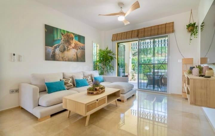 Planta baja con jardín privado y licencia turística en Riviera del Sol