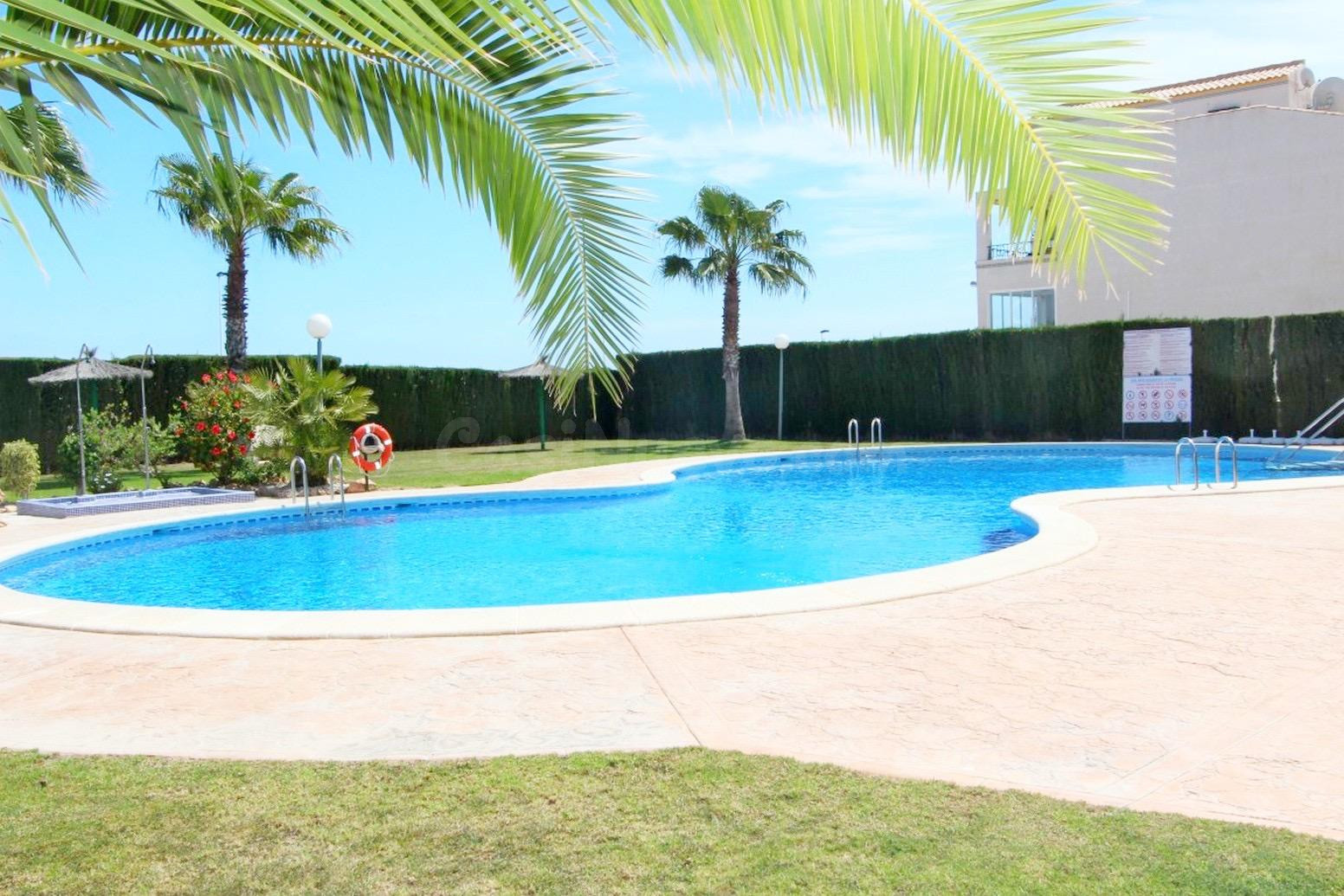 APARTAMENTO DE 2 DORMITORIOS CON PISCINA COMUNITARIA Y VISTAS LATERALES AL MAR - ZONA LA CIÑUELICA, ORIHUELA COSTA -