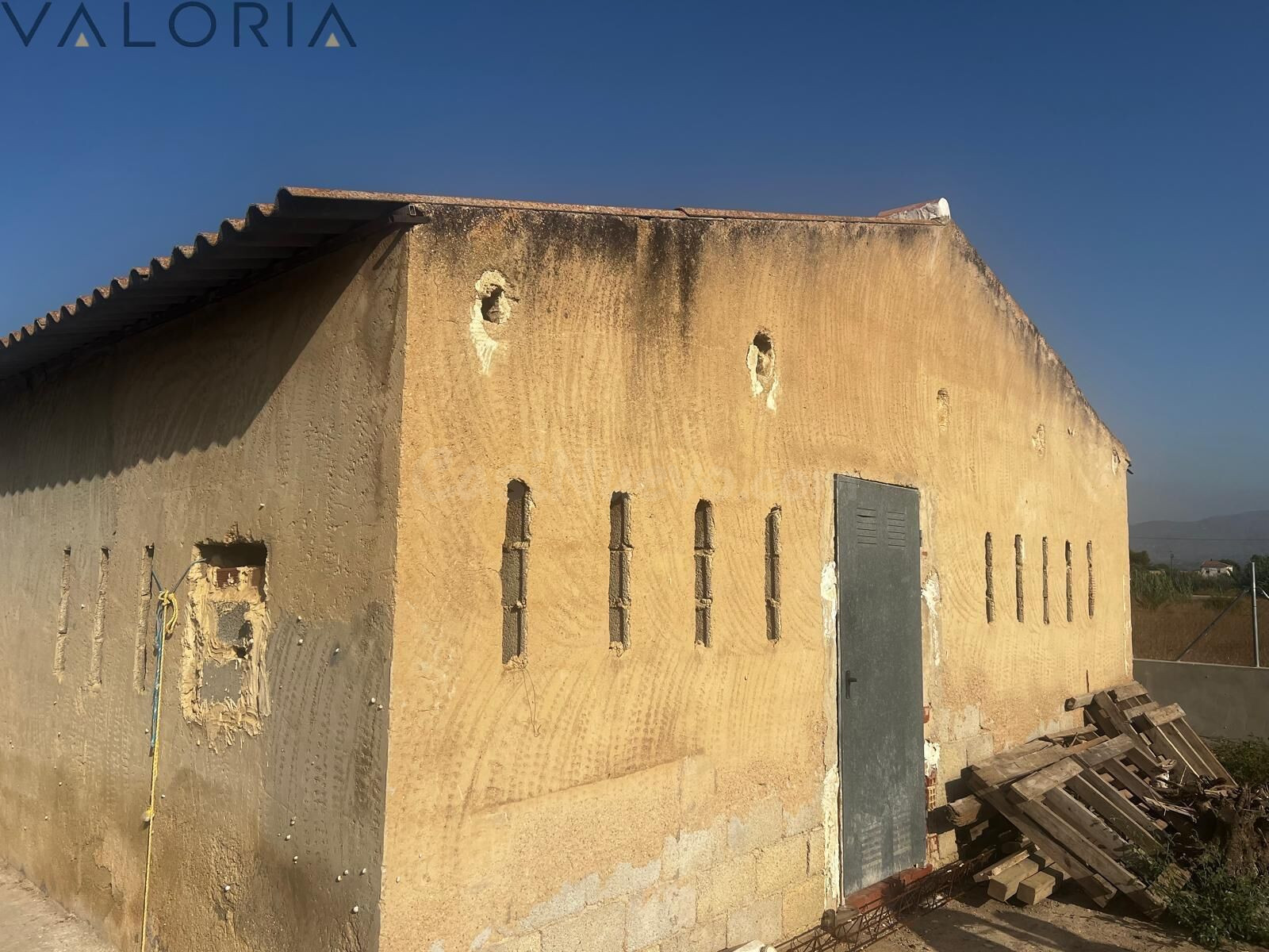 Parcela de 11.000 m2 con construcción de 130 m2 en San Felipe Neri