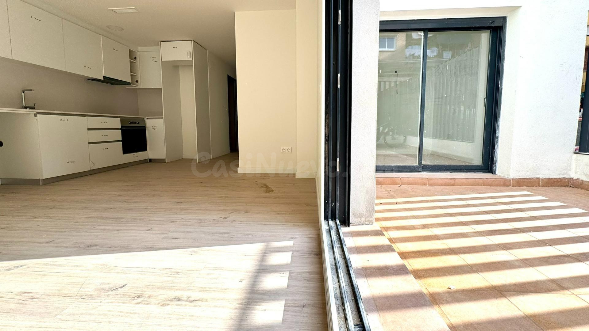 Planta baja de obra nueva con terraza en El Carmel, Horta, Barcelona.