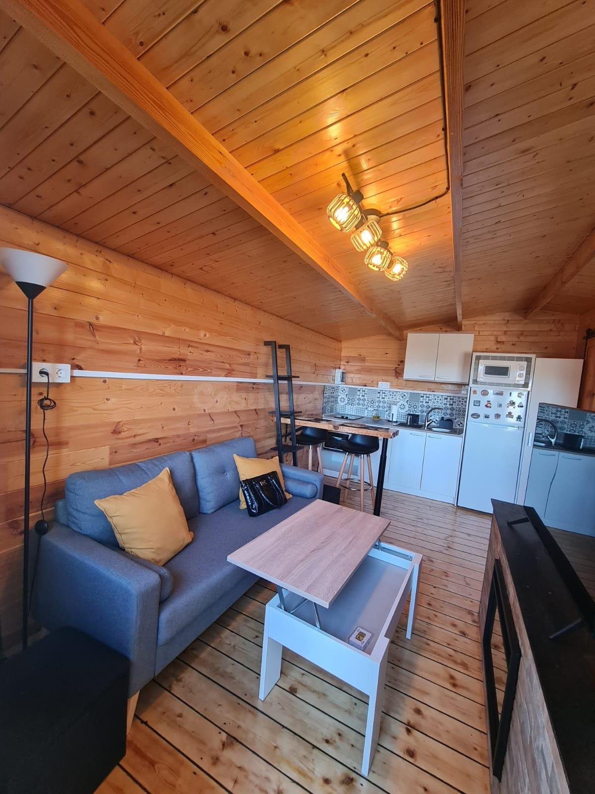 Parcela con una casita de madera en Cumbres Verdes.