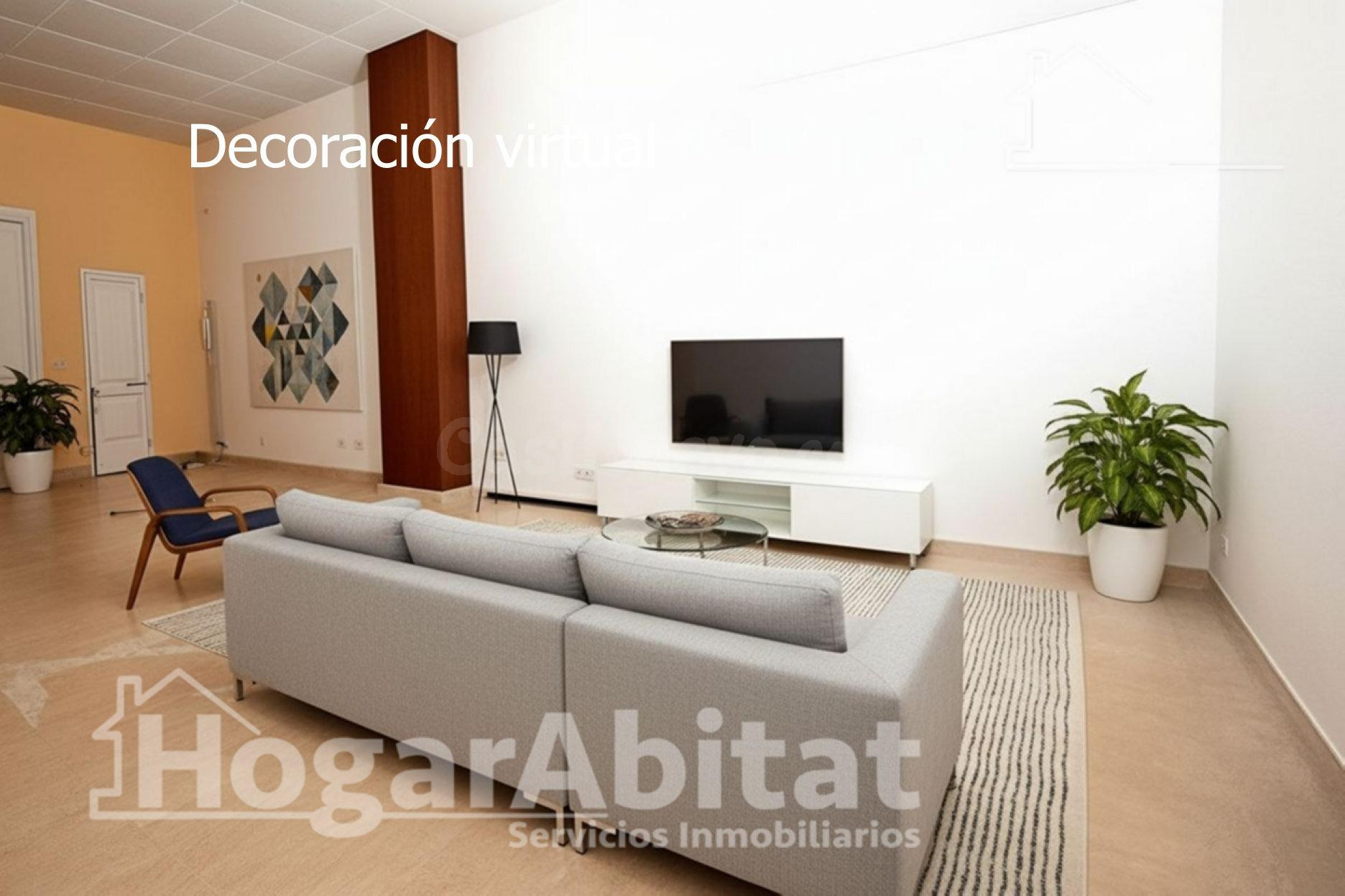 Amplia casa con dos terrazas y garaje