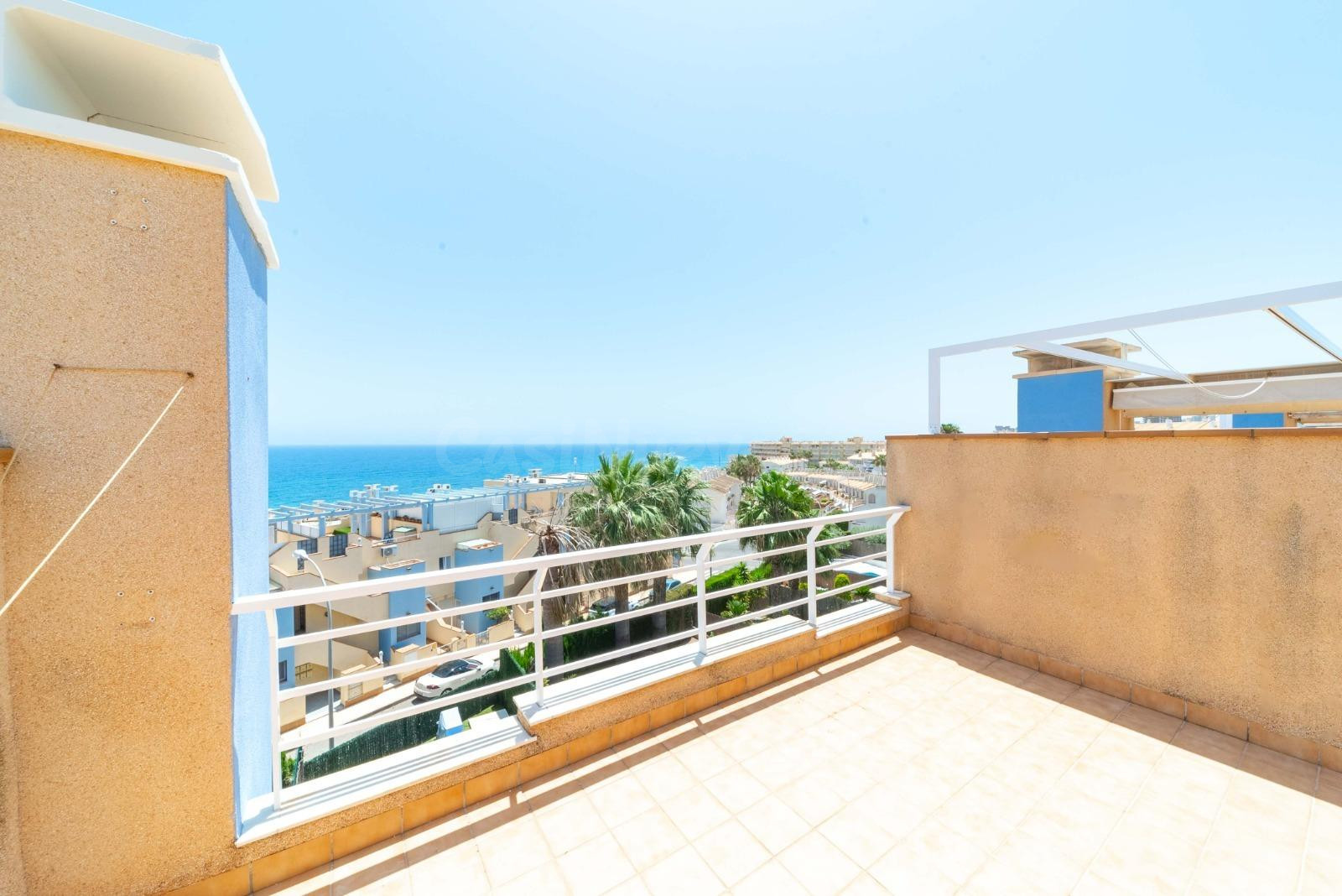 Aguamarina chalet adosado con piscina  y vistas al mar a 100 m de la playa
