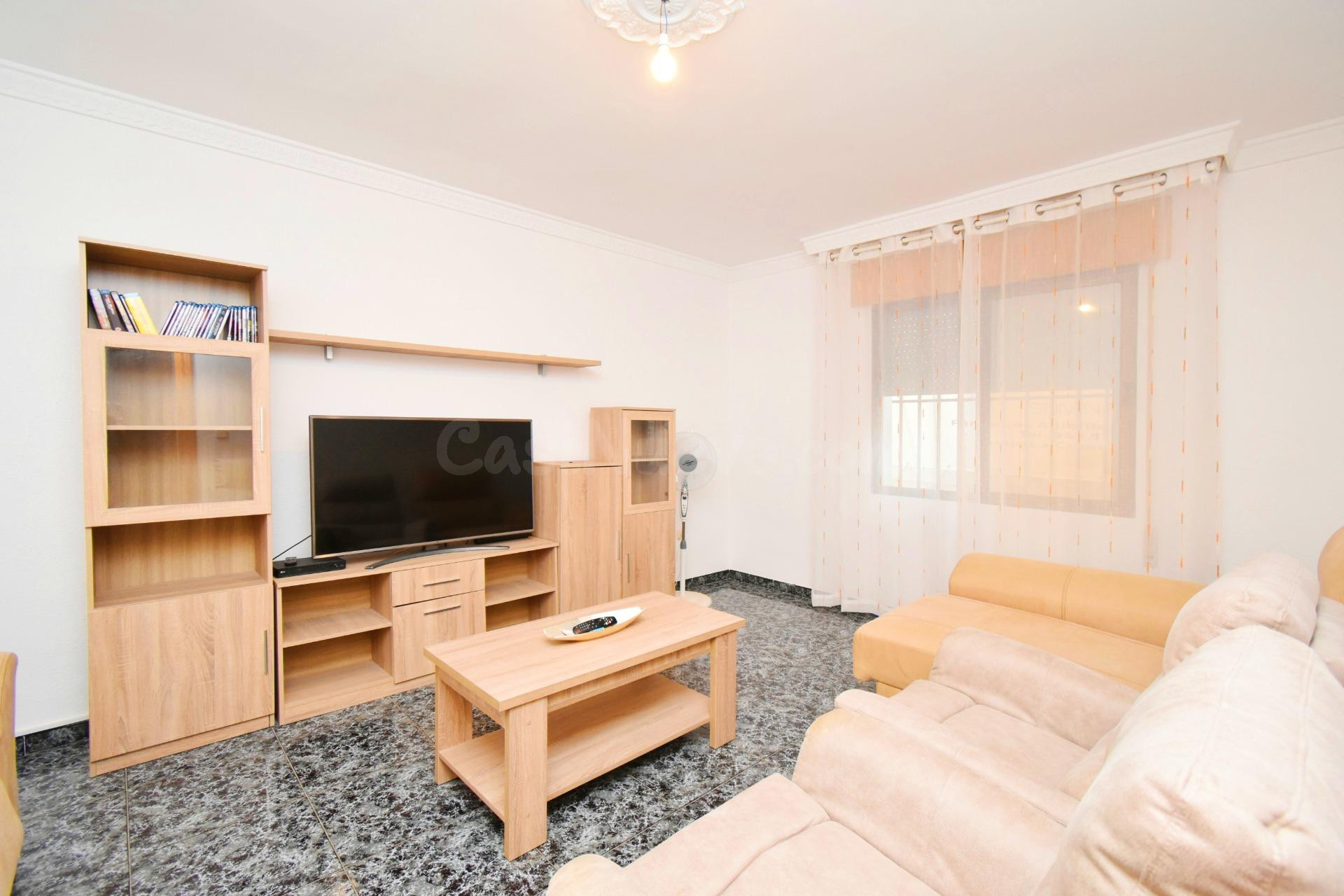 VIVIENDA DE PLANTA BAJA CON SOLARIUM Y COCHERA