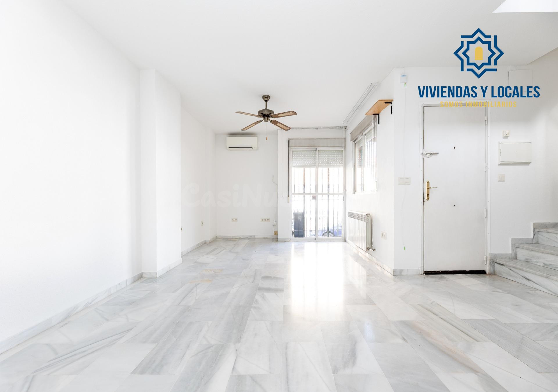 Vive en el corazón de Armilla: 4 dormitorios, patio, terraza y garaje