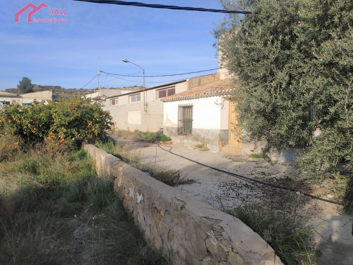 PARCELA CON VIVIENDA Y NAVE