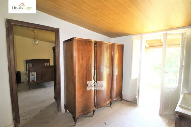 2 CASAS DE PIEDRA EN O CORGO — 44