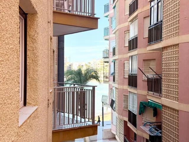 Apartamento reformado de 2 dormitorios en primera línea de Playa del Cura con vistas laterales al mar — 26