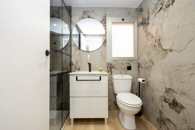 Planta baja con terraza privada, 3 dormitorios, 2 baños y garaje — 13