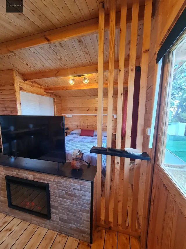 Parcela con una casita de madera en Cumbres Verdes. — 2