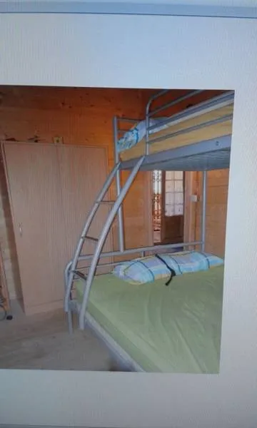 TERRENO URBANO CON CASA DE MADERA Y CASA DE CEMENTO. — 9