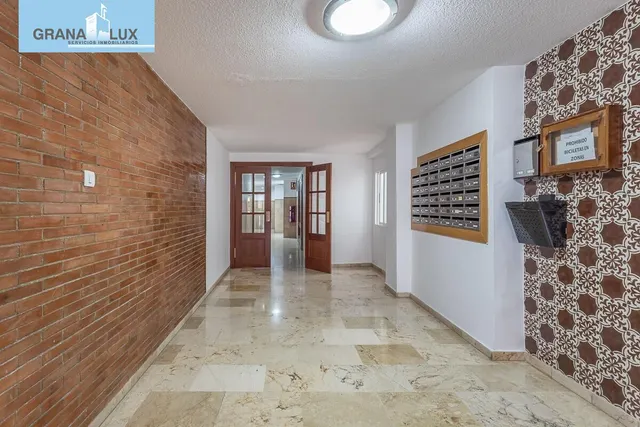 Piso reformado junto a triunfo — 18