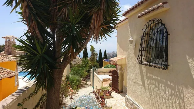 Villa en Benitachell con piscina y vistas al mar — 24