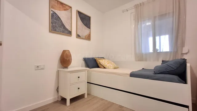 Una vivienda reformada con excelentes espacios exteriores, solárium privado y vistas al mar — 24