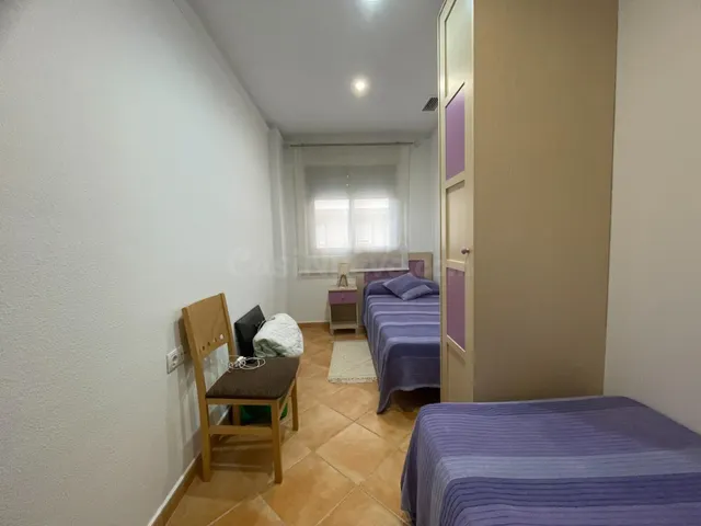 Apartamento reformado de 2 dormitorios con piscina comunitaria — 12