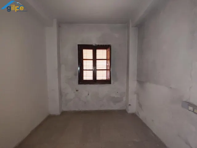 PLANTA BAJA, 3 DORMITORIOS Y 1 BAÑO — 12