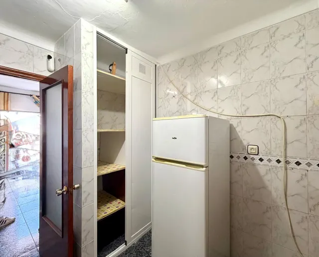 Casa de pueblo en pleno centro de La Joya con dos viviendas independientes y parcela de 500 m2 — 22