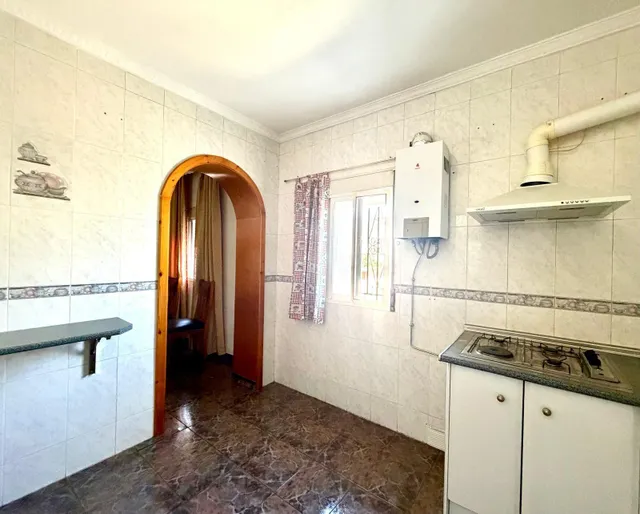 Casa de pueblo en pleno centro de La Joya con dos viviendas independientes y parcela de 500 m2 — 19