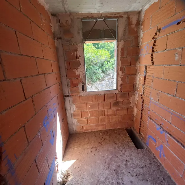 Cuatro casas en contrucción. — 11