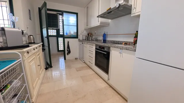 Apartamento de planta baja de esquina con 2 dormitorios con jardin y vistas parciales al mar — 12