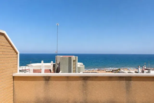 Ático dúplex con vistas frontales al mar y amplio solárium en Guardamar del Segura — 29