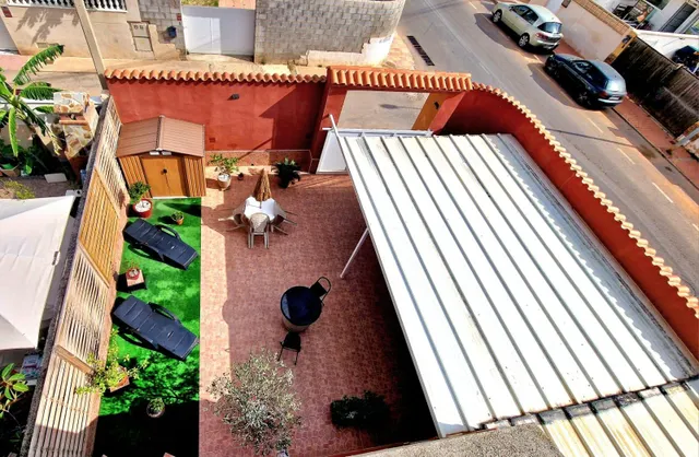 CHALET ADOSADO DE ESQUINA TOTALMENTE REFORMADO CON JARDÍN Y SOLÁRIUM — 24