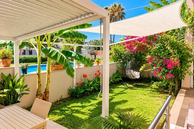PLANTA BAJA CON JARDIN PRIVADO Y PISCINA COMUNITARIA
