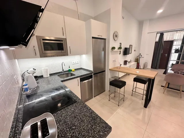 APARTAMENTO EN EXPLOTACIÓN TURÍSTICA — 23