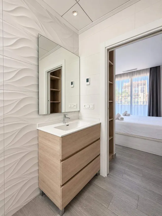 Exclusiva vivienda adosada de diseño a solo 800 metros del mar — 14