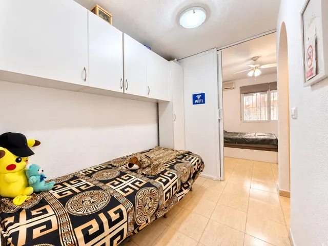 Estudio con zona de dormitorio extra y piscina — 6