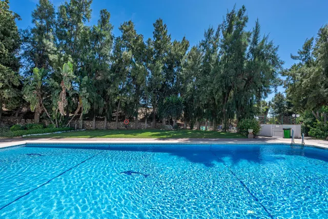 ¡Oportunidad en Doña Pilar! Piso de 2 dormitorios con piscina, jardines, parking y pista de tenis — 22