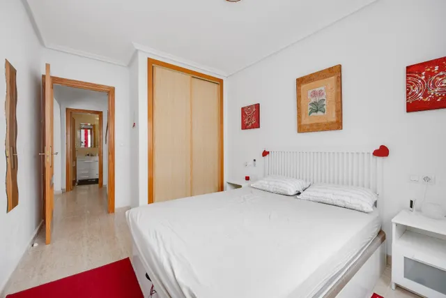 Apartamento dúplex con piscina comunitaria, Alicante, Orihuela Costa. 2 habitaciones, 89 m2, 1,6 kilómetros del mar — 18