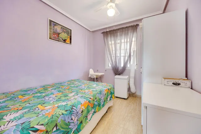 Bungalow de dos dormitorios y piscina comunitaria en Orihuela Costa — 7