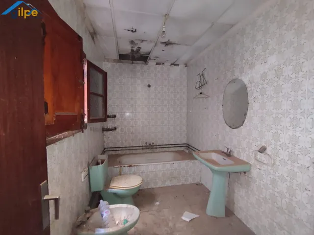 PLANTA BAJA, 3 DORMITORIOS Y 1 BAÑO — 11