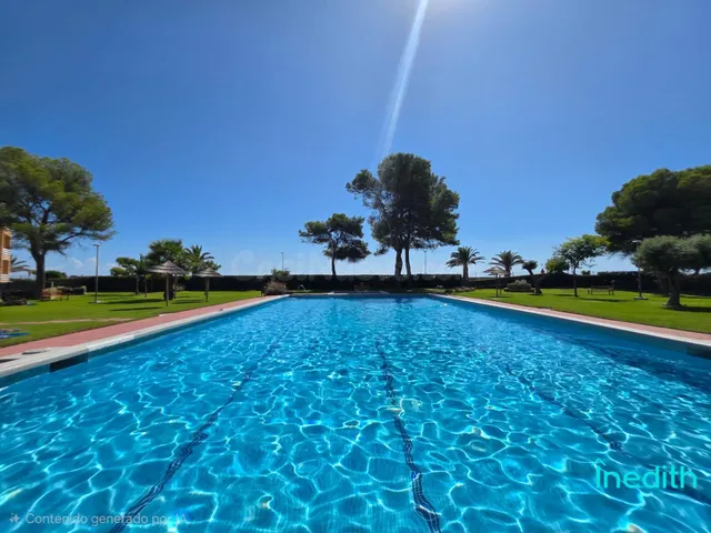 Bonita planta baja con acceso directo al mar y piscina comun