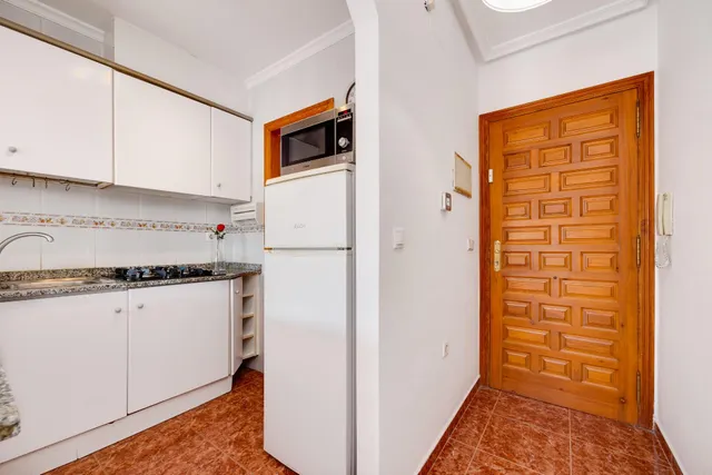 Apartamento de dos dormitorios en residencial con piscina comunitaria — 13