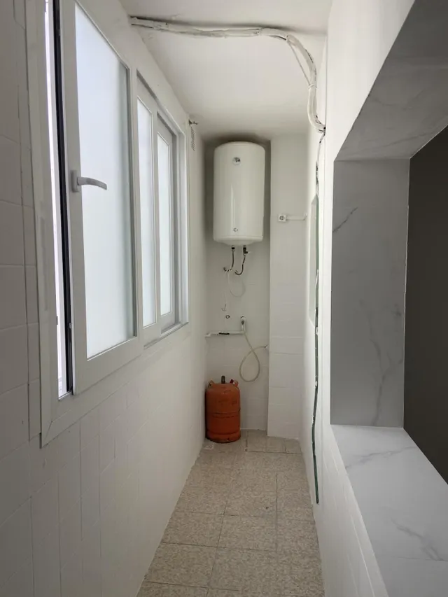 Piso en Avenida Almogávares. Tres dormitorios. Dos terrazas. — 11