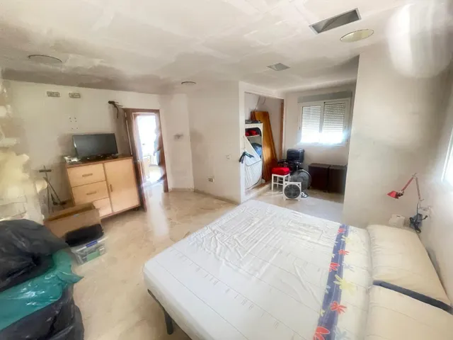 CASA ADOSADA EN LA NUCÍA CON GRANDES POSIBILIDADES — 11