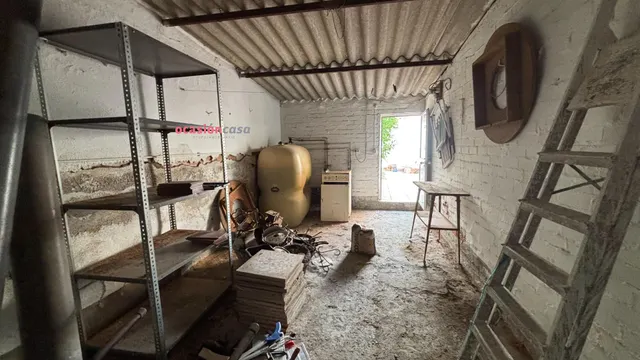 CASA CON PATIO Y COCHERA A LA VENTA — 19