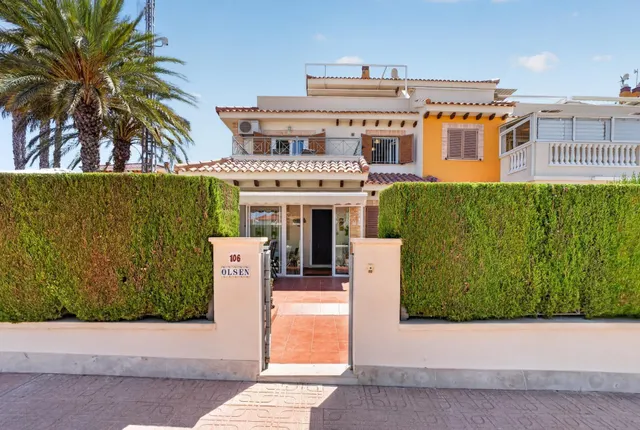 Residencial Zeniamar VIII – Acogedor adosado en esquina con solárium, piscina comunitaria, garaje y trastero — 28
